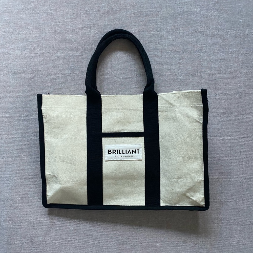 Langham cream & black canvas tote travel logo bag.